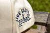 Live Salty & Stay Breezy embroidery on side of cap.