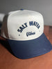 Premium 3D embroidered beach hat built for days near the water. Khaki & navy with "Live Salty & Stay Breezy" stitched on the side. 