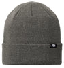 TravisMathew Solid Cuffed Beanie in the Dark Heather Grey color option. Comes with custom engraved leather patch is sewn to the Beanie cuff.